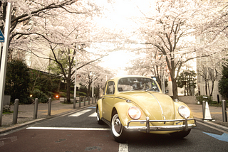 An outdated car in a street