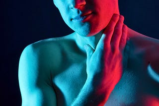 Image a man looking into the mirror.