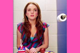 Cady Heron eats lunch alone in the school bathroom.