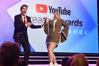 An image of Brittany Broski (“Kombucha girl”) and Brandon Rogers (comedian) at the YouTube Streamy Awards.