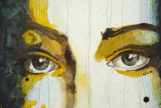 woman’s artistic rendition of a face, yellow, cream, and dark brown