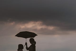 Image of Mother and Daughter taken by J W on UnSplash.com