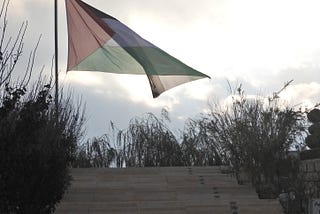 Palestinian flag at memorial for Palestinian poet Mahmoud Darwish, Ramallah, Palestine [Photo by the author, 2016]