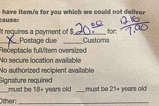 Crop of an actual notice from the post office showing $20 postage due for packages