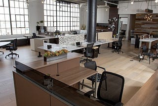 Bright, clean office with plenty of space around the workstations