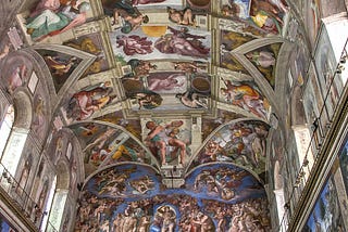 The Sistine Chapel, full of intricate frescoes.