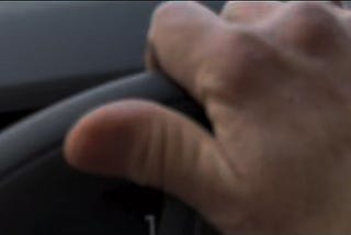 grasping the wheel