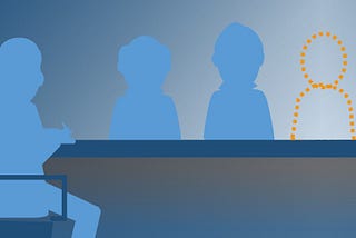An illustration of seated figures around a table in blue, with one silhouette of a missing participant outlined in yellow