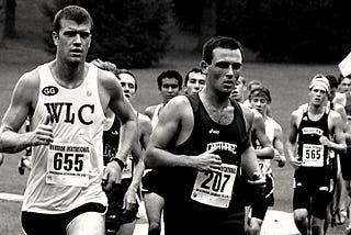 A group of cross country runners in a race