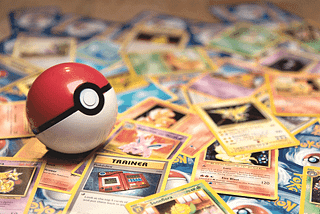 Pokéball toy and Pokemon cards