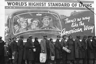 “Margaret Bourke-White’s 1937 picture of African American men, women and children huddled in line before a billboard — on which a car bearing a beaming white family (and their dog!) appears to drive confidently into the future beneath the ultimately ironic slogan, ‘World’s Highest Standard of Living’” (Time Magazine). Although taken to illustrate the aftermath of a flood, it has come to represent the vast inequalities racism has permitted in America.