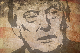 An artistic rendering of Donald Trump’s face on a background of the American Flag. Image is worn and faded.