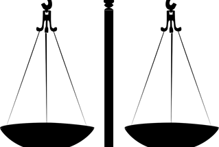 an analog balancing scale; used as an image of fairness