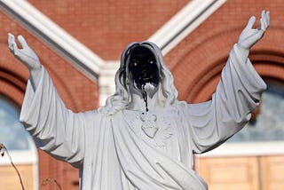 The woman who drove a car through her ex’s funeral and vandalized a statue of Jesus.