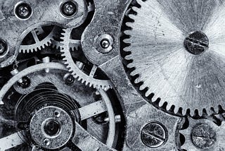black and white picture of gears to an unspecified machine