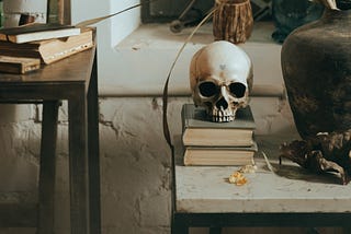 A skull resting on a couple of books