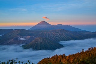 mountain tops above the clouds
