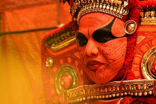 Person in facial paint and costume photo