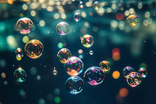 Colorful bubbles dancing in water.