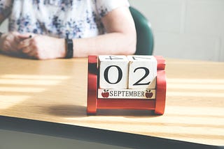 A school block desk calendar for September 2nd