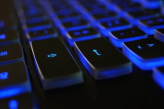 Photo by Marta Branco: https://www.pexels.com/photo/closeup-photo-of-black-and-blue-keyboard-1194713/