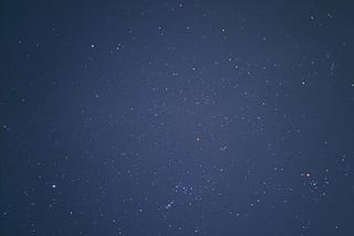 A starry sky dotted with many stars