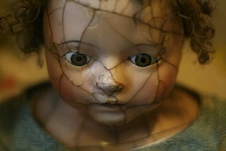 a creepy toy doll