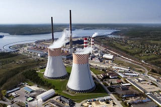 fossil fuel power plant burning coal to produce electricity and heat for local community located in Rybnik and near lake