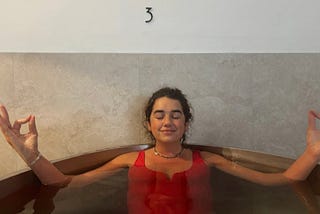 photo of a girl (me) inside a tub with water