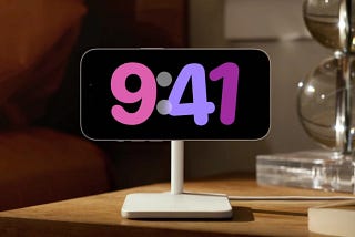 An image of a iPhone that is on a apple stand and showing the time of 9:41