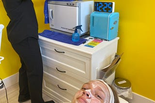 Seventh-grader getting treated to a luxurious facial at an expensive boutique