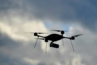 Technical diagram for the use of fiber optic drones with wired connections for secure data transmission in military applications.