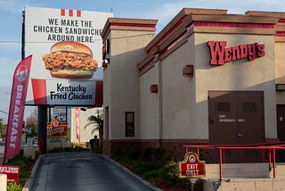 KFC Chicken sandwich billboard on Wendy’s property