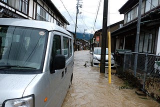 Biking Around Japan — Day 99: Kyoto Floods and Summer Clouds