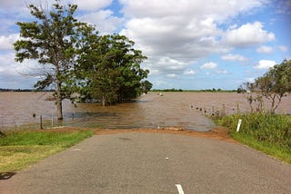 Flood water encroach on a road