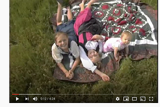 Screenshot of the video for “Victory Day” by Prussian Blue on YouTube. The song celebrates a “purging” of non-white people.