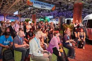 A large crowd gathers in the AppExchange Den at a past Dreamforce event.