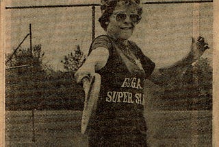 Me hitting a backhand playing tennis in the Erie County Girls Athletic Association Super Stars competition, circa 1975.