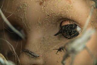 A lost, broken doll