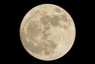 Einstein and Wheeler: Is the Moon There Whether We See It or Not?