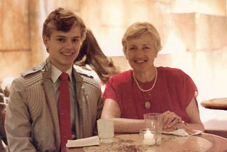 The author and his mother at a table drinking coffee in the lobby of Trump Tower in 1984 — soon after its opening