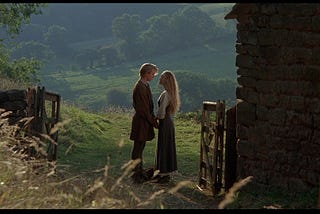 Still from The Princess Bride of Westley and Buttercup on her farm overlooking a green valley