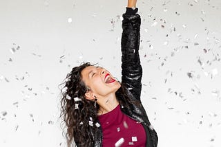 Woman celebrating with glitter