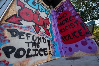 READER: The Economics of Defunding the Police