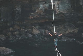 person on tightrope