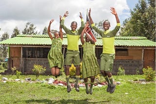 Young Kenyans celebrate fantastic exam results for the third year in a row