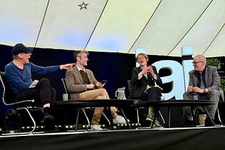 Steve Fuller (left) menacingly pointing his finger at Massimo Pigliucci (right). Also in the picture, moderator Jay Shapiro and co-panelist Joanna Kavenna, a novelist. Photo by Jennifer Sears.