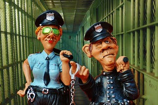 Artwork of two prison officers, a woman and a man, done in humourous, silly style