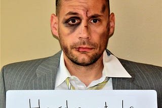 Picture of man with beat up face