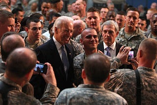 Then-VP Joe Biden visits Baghad’s Camp Victory in 2011 to greet U.S. soldiers